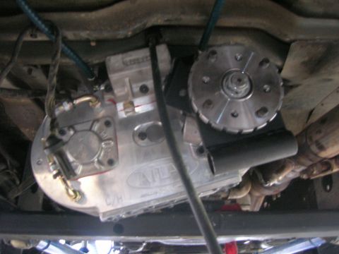 1996 Ford Bronco - Vehicle's transfer case and exhaust system shown from below.