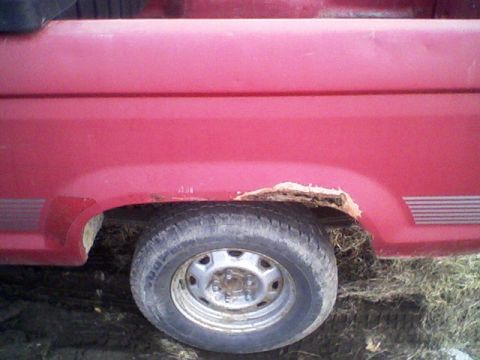 1992 Ford Ranger - This 1992 Ford Ranger shows significant rust around the rear wheel well.