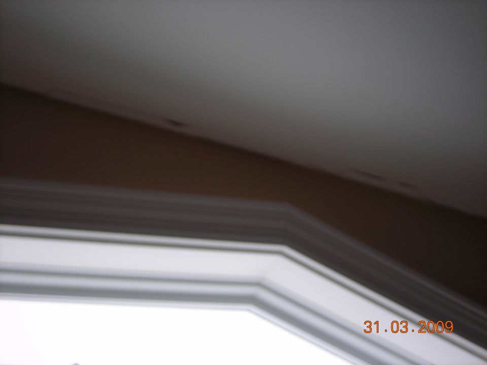 Interior ceiling and window trim with date stamp