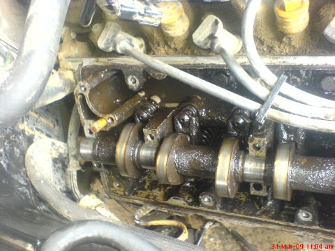 1992 Ford Crown Victoria - Close-up view of the internal engine components, showing the camshaft and associated valve train parts.