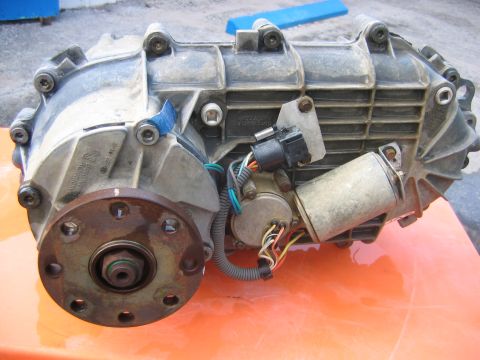 1992 Ford Bronco - This transfer case, likely from a 1990s era SUV, is shown from the side with its various electrical components visible.