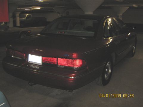 1997 Ford Crown Victoria - Rear view of a 1997 Ford Crown Victoria parked indoors.