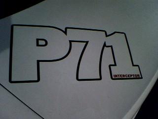 2001 Ford Crown Victoria - Close-up of a P71 Interceptor badge, likely from a Ford vehicle.