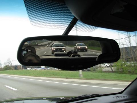 2003 Mercury Marauder - A 2003 Mercury Marauder is seen in the rearview mirror while driving on the highway.