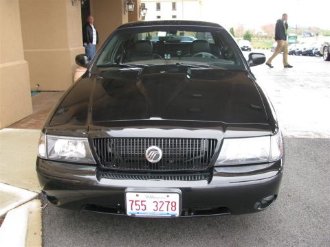 2003 Mercury Marauder - Frontal view of a black 2003 Mercury Marauder, showing its distinctive grille and headlights.
