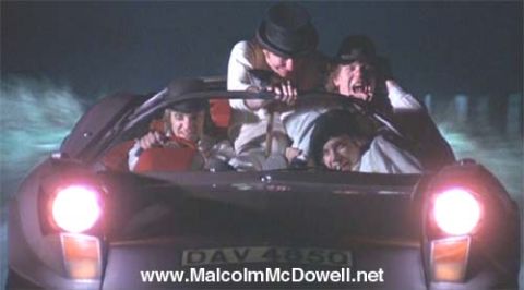 1995 Ford Bronco - Four people are crammed into a car at night, with the driver looking distressed.