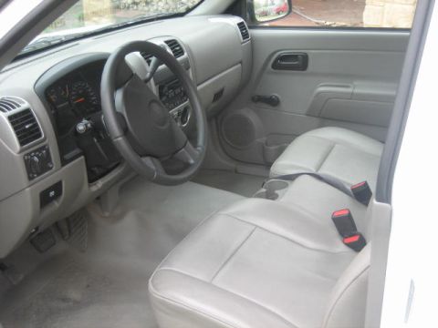 1996 Ford Thunderbird - Interior of a pickup truck, showing the dashboard, steering wheel, and front seats.