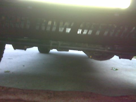 2008 Jeep Wrangler - This photo shows the undercarriage of a vehicle, focusing on the frame and suspension system.