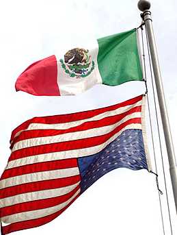 1973 Ford Torino - Mexican and American flags are displayed on a flagpole, with a Supermotors watermark visible at the bottom of the image.