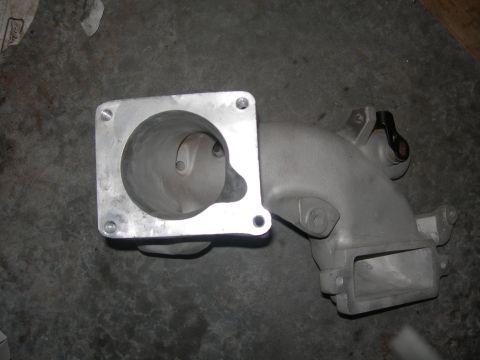 1984 Ford Bronco - Throttle body and intake manifold assembly, likely for an older vehicle.