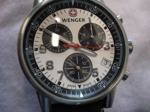 2000 Ford Crown Victoria - Close-up of a Wenger chronograph watch, a white face with black markings and three subdials.