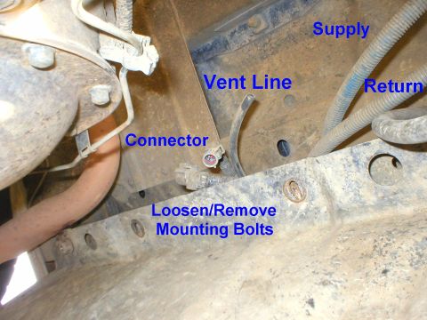1983 Ford Bronco - To remove the tank, begin by disconnecting the wiring and vent line, & removing most of the skid plate bolts. Most Broncos use bolts with a…