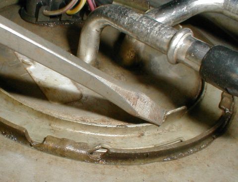 1983 Ford Bronco - Unlock Ring A non-sparking drift is preferred, but with some water still on the tank, the chance of fire is low. Carefully tap each of the…