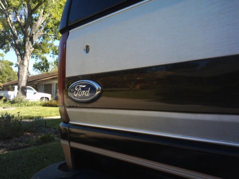 1994 Ford Bronco - Rear view of a 1994 Ford Bronco, showing the Ford emblem.
