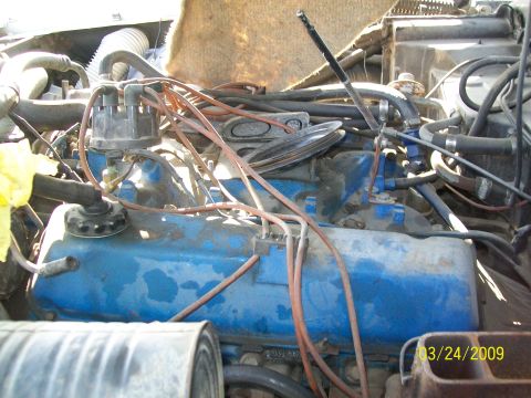 1972 Ford Ranchero - Close-up view of a vehicle's engine bay, showing various components and wiring.