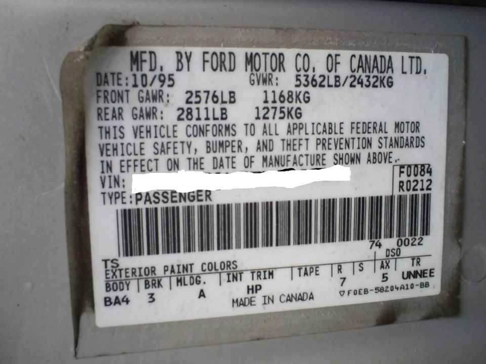 Ford Motor Co. of Canada certification label with 10/95 build date, GVWR, GAWR and paint and trim codes