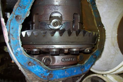 1976 Chevrolet C/K Pickup - Close-up of a differential gear assembly, showing internal components and a blue gasket.