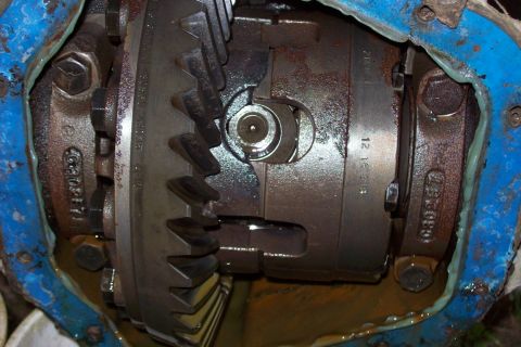1976 Chevrolet C/K Pickup - The internal workings of a vehicle's differential are shown, with gears and housing details visible.