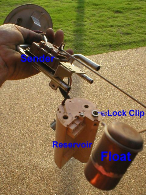 1983 Ford Bronco - Reservoir Removal Remove the level sender upper mounting screw, press & hold the lock clip down, then lift the tube assembly from the reser…