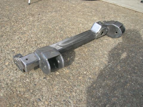 1996 Ford Bronco - Custom fabricated metal suspension arm with various attachment points.