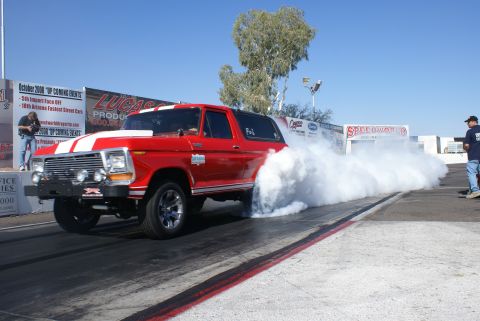 1979 Ford Bronco - 1979 Ford Bronco performing a burnout at a drag racing event.