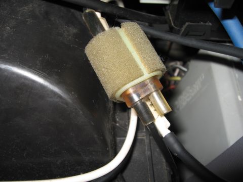 1994 Ford Bronco - A vacuum hose filter with foam covering and plastic fittings is shown.