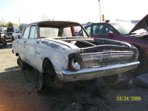 1972 Ford Ranchero - Junkyard find: a 1960 Ford Falcon sedan missing its hood and engine.