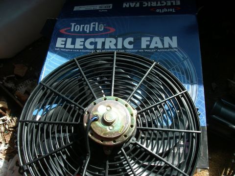 1978 Ford Bronco - TorqFlo electric fan, part number visible on box, ready for installation.
