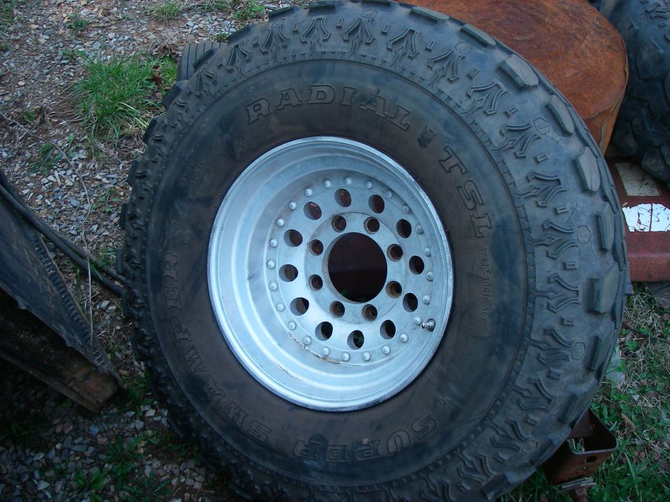 Super Swamper Radial TSL off-road tire on a polished aluminum wheel