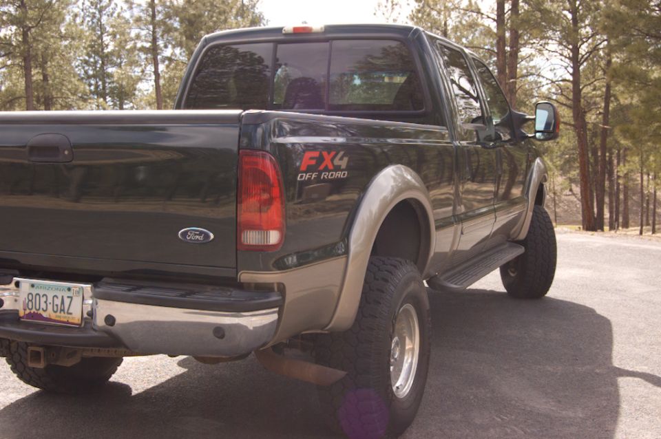 2003 Ford F-350 FX4 Off Road pickup truck rear view, parked outdoors