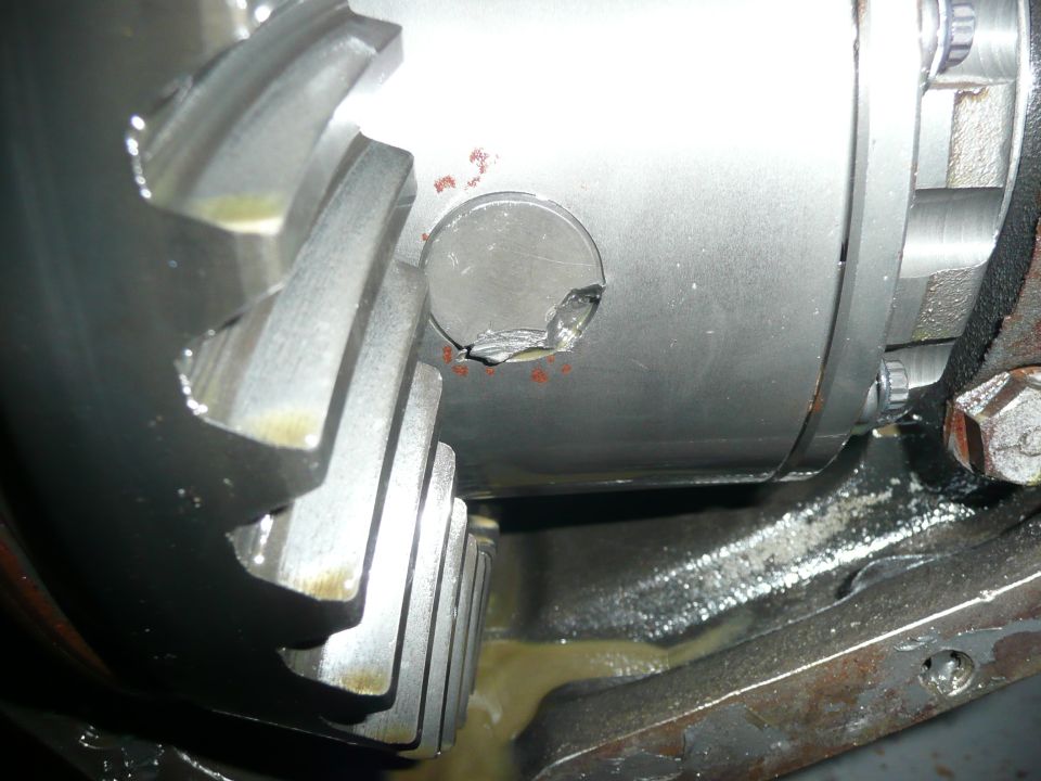 ...no cross pin retainer means the cross pin tries to walk out...