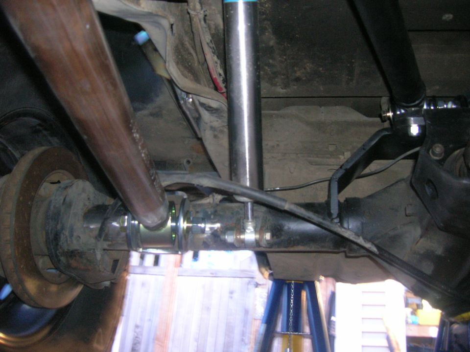 Underside of a 1996 Ford Bronco rear axle and suspension.