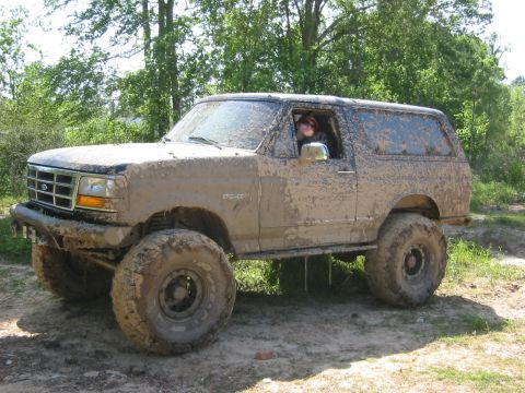1995 Ford Bronco - 1995 Ford Bronco covered in mud after off-roading.