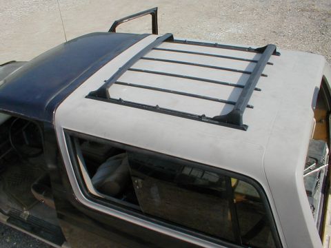 1983 Ford Bronco - I cut the front of the tracks down by 1 screw hole and installed 2 rear crossbars because they can both be (re)moved without tools. The ori…