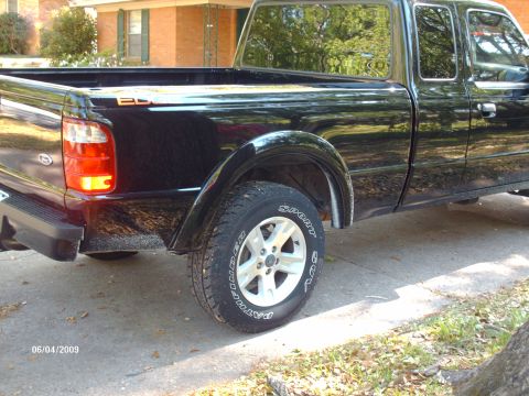 1990 Ford F-150 - Rear view of a black pickup truck with an "ED" decal on the bed. Date stamp reads 06/04/2009.