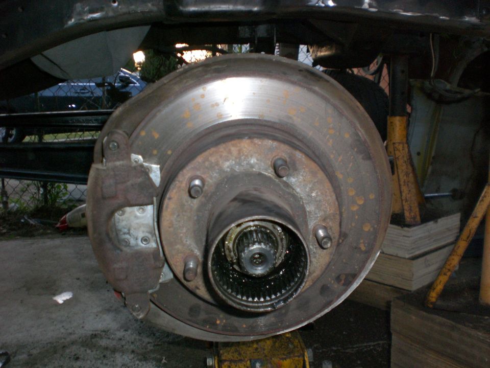 In this position you will need to gring a small amout off the caliper and off the knuckle just under the stop bolt.