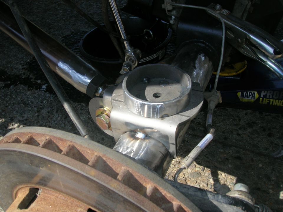 Custom suspension part with brake rotor on a vehicle