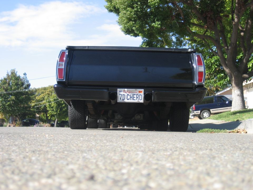 Rear view of a black 1970 Ford Ranchero with a California license plate.