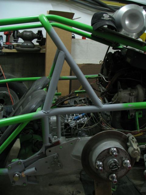 1987 Ford Supercrewzer - Custom off-road vehicle chassis under construction, showing engine and suspension details.