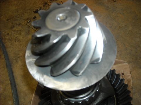 1979 Ford F-150 - Close-up of a differential ring gear and pinion gear assembly, showing metal components.