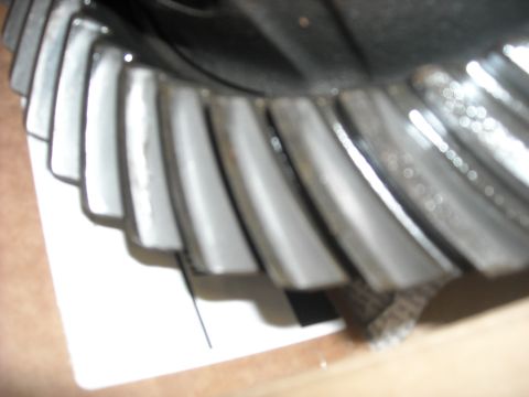 1979 Ford F-150 - A close-up of a differential gear shows its teeth and wear patterns.
