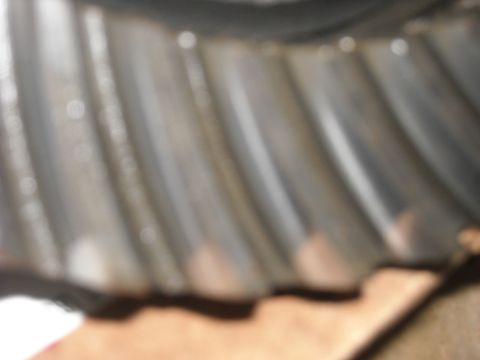 1979 Ford F-150 - A close-up view of the teeth on a metal gear component.