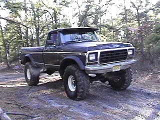 1990 Ford Bronco - This lifted 1979 Ford F-150 pickup truck is equipped with large off-road tires.