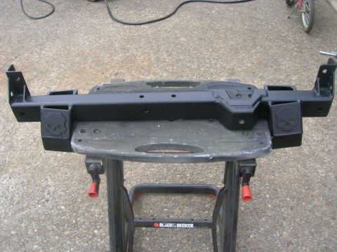 1996 Ford Bronco - This aftermarket rear bumper features skull emblems and is mounted on a Black & Decker workbench.