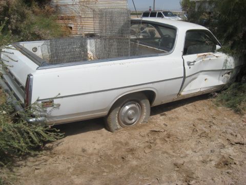 1973 Ford Ranchero - This vehicle appears to be a 1970 Ford Ranchero, not a 1973 model, with significant body damage.