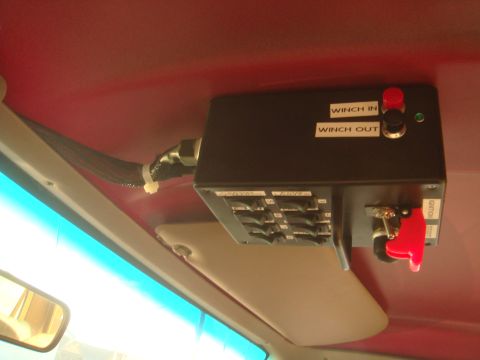 1992 Ford Bronco - Custom overhead switch panel with winch controls and auxiliary switches.