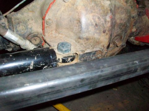 1992 Ford F-350 - A close-up view of a vehicle's differential housing, showing signs of wear and tear.