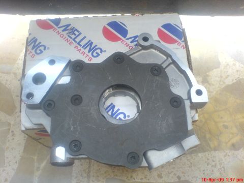 1992 Ford Crown Victoria - MELLING engine parts oil pump shown with its original packaging.