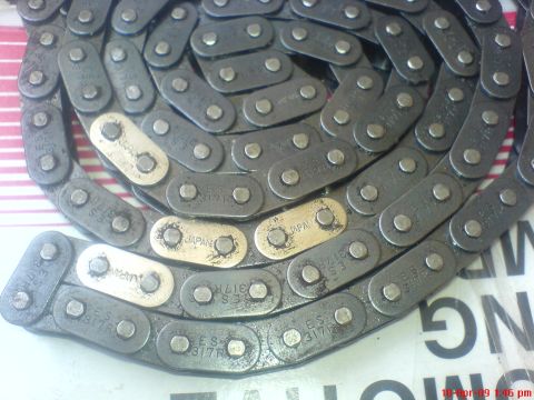 1992 Ford Crown Victoria - Close-up of a timing chain, showing part numbers and country of origin.