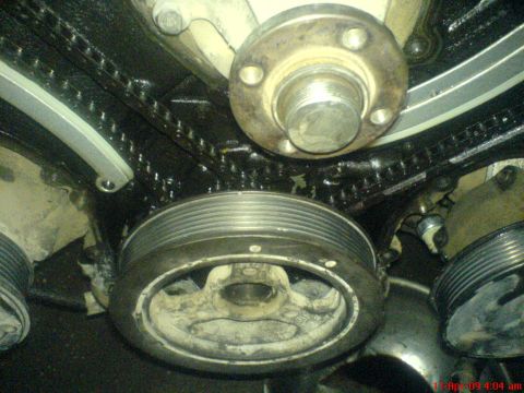 1992 Ford Crown Victoria - Engine timing chain and crankshaft pulley assembly detail.